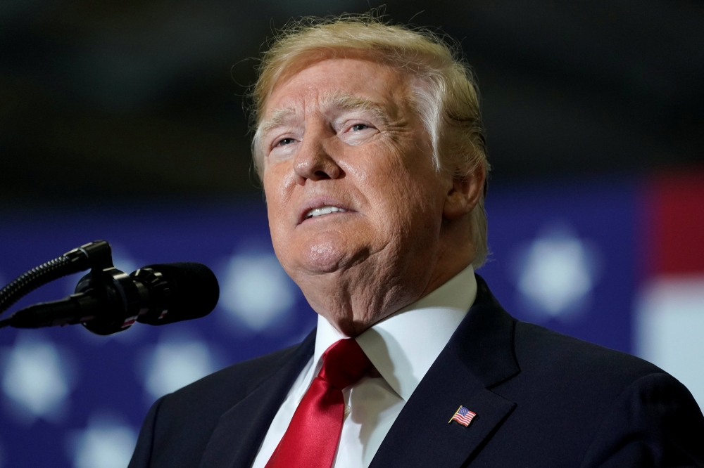U.S. President Donald Trump speaks at a Make America Great Again Rally in Washington, Michigan April 28, 2018. REUTERS/Joshua Roberts