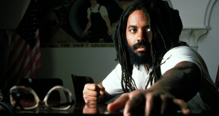 The former Black Panther spent 29 years on death row while maintaining his innocence in the 1981 murder of white Philadelphia police Officer Daniel Faulkner. Abu-Jamal's sentence was reduced to life without parole in 2011.  (Photo courtesy:  kentakepage.c