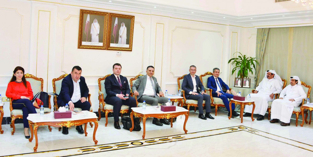 Mohamed bin Ahmed bin Towar Al Kuwari (second right), Vice-Chairman, Qatar Chamber, and Saleh bin Hamad Al Sharqi (right), Director-General, Qatar Chamber, with visiting MUSIAD delegation, at Qatar Chamber premises.
