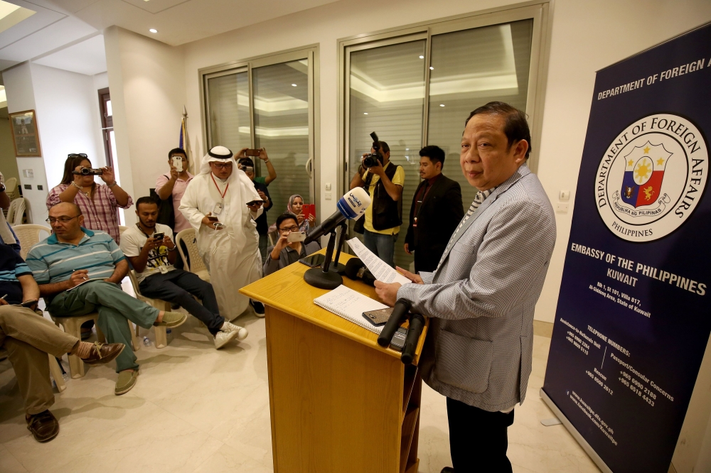 (FILES) This file photo taken on April 21, 2018 shows Filipino Ambassador in Kuwait Renato PO Villa speaking during a press conference at the Philippines embassy in Kuwait City. AFP / YASSER AL-ZAYYAT