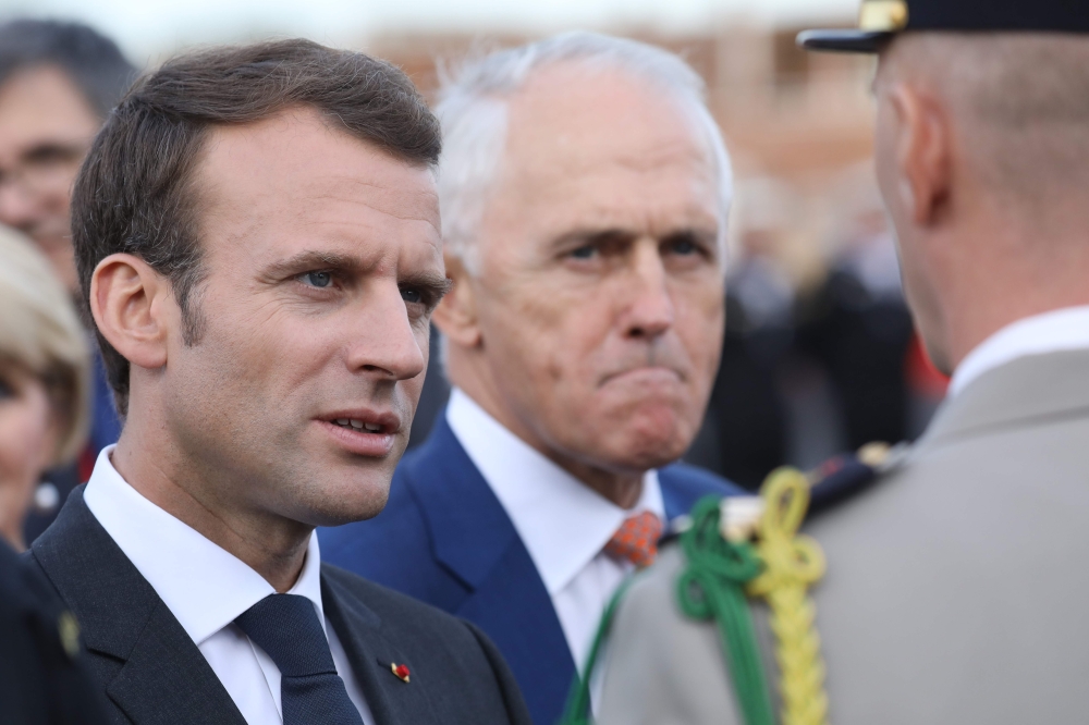 French President Emmanuel Macron visits an Australian Navy base at Garden Island in Sydney on May 2, 2018.  / AFP / POOL / LUDOVIC MARIN /