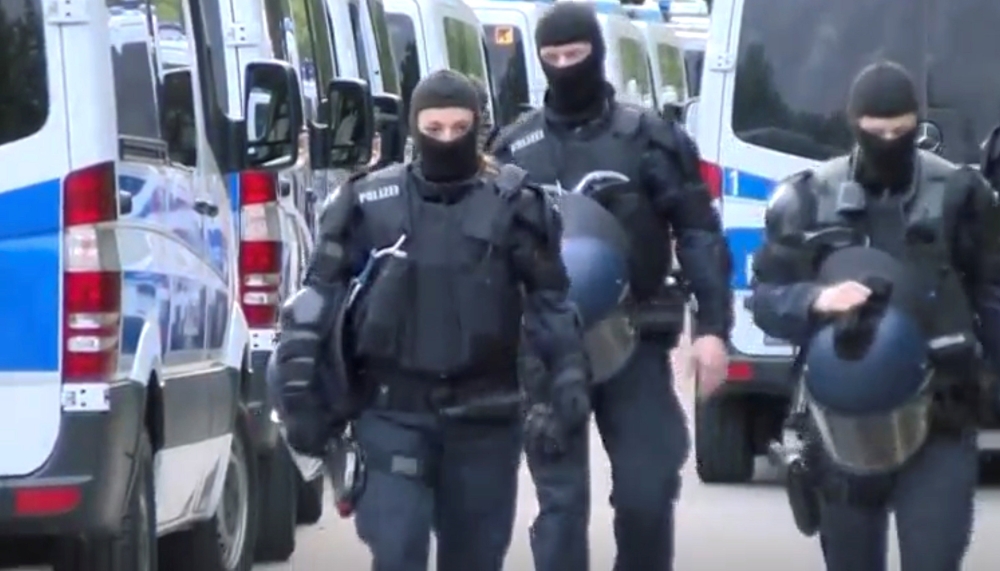 Police arrive at the migrants home in Ellwangen, Germany May 3, 2018. Reuters/Reuters TV 