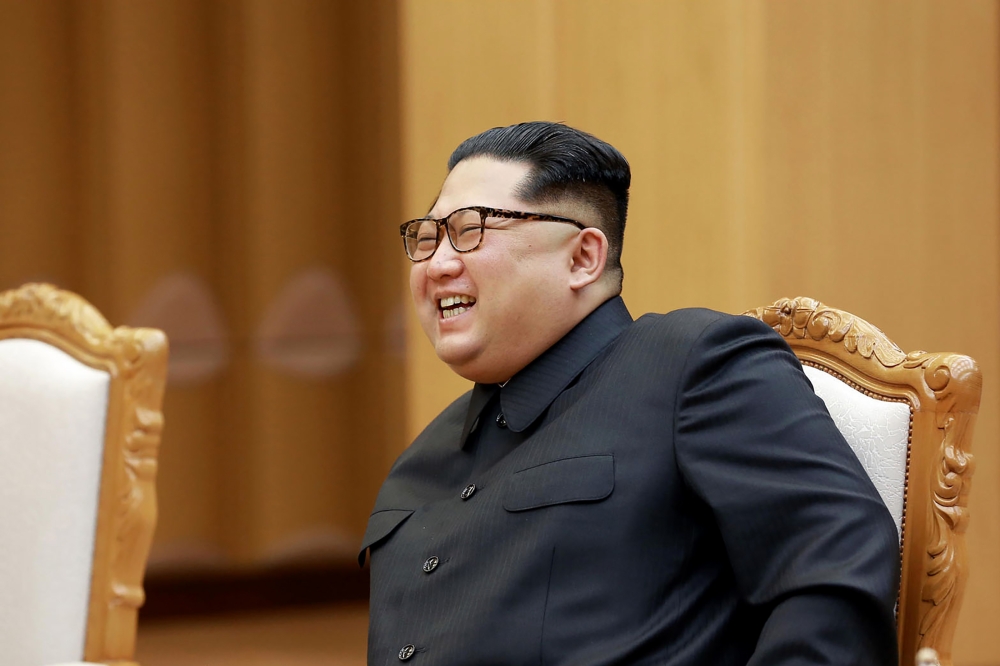 This picture taken on May 3, 2018 and released from North Korea's official Korean Central News Agency (KCNA) on May 4, 2018 shows North Korea's leader Kim Jong Un attending a meeting with China's foreign minister at an undisclosed location in North Korea.