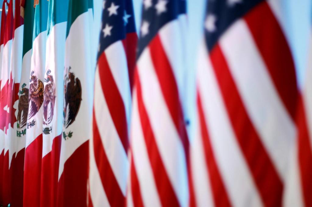 File photo of flags of Canada, Mexico and the US are seen before a joint news conference on the closing of the seventh round of NAFTA talks in Mexico City, Mexico March 5, 2018. REUTERS/Edgard Garrido