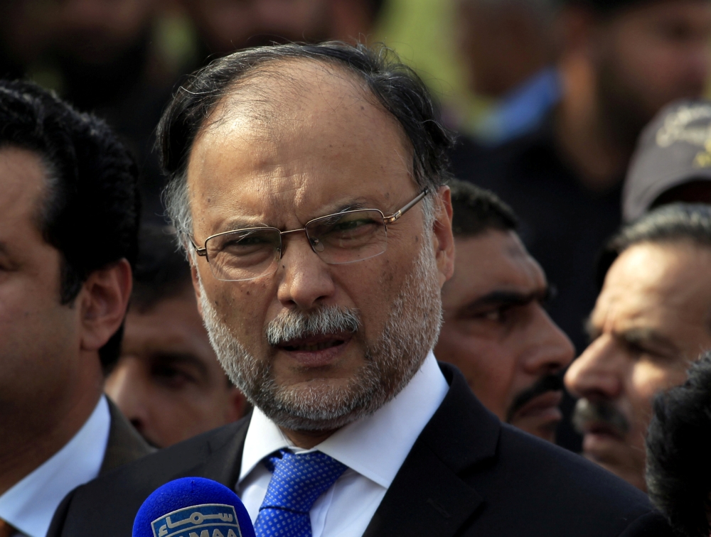 File photo of Pakistan's Interior Minister Ahsan Iqbal speaking to media outside the accountability court in Islamabad, Pakistan October 2, 2017. REUTERS/Faisal Mahmood/File Photo