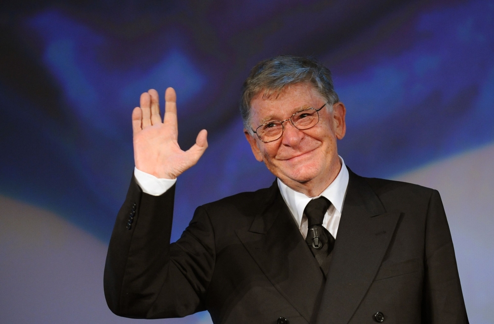 In this file photo taken on September 5, 2008 Italy's director Ermanno Olmi poses before receiving a Golden Lion for lifetime achievement at the 65th Venice International Film Festival in Venice Lido on September 5, 2008.  AFP / Alberto Pizzoli