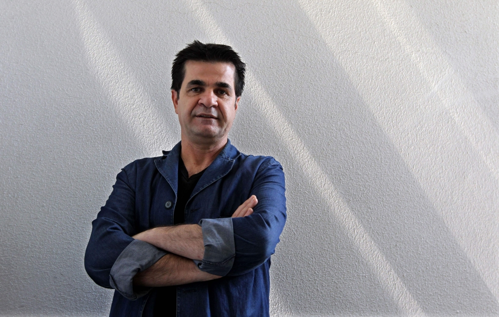 In this file photo taken on August 30, 2010 Iranian film director Jafar Panahi poses during an interview with AFP in Tehran.  AFP / Atta Kenare 