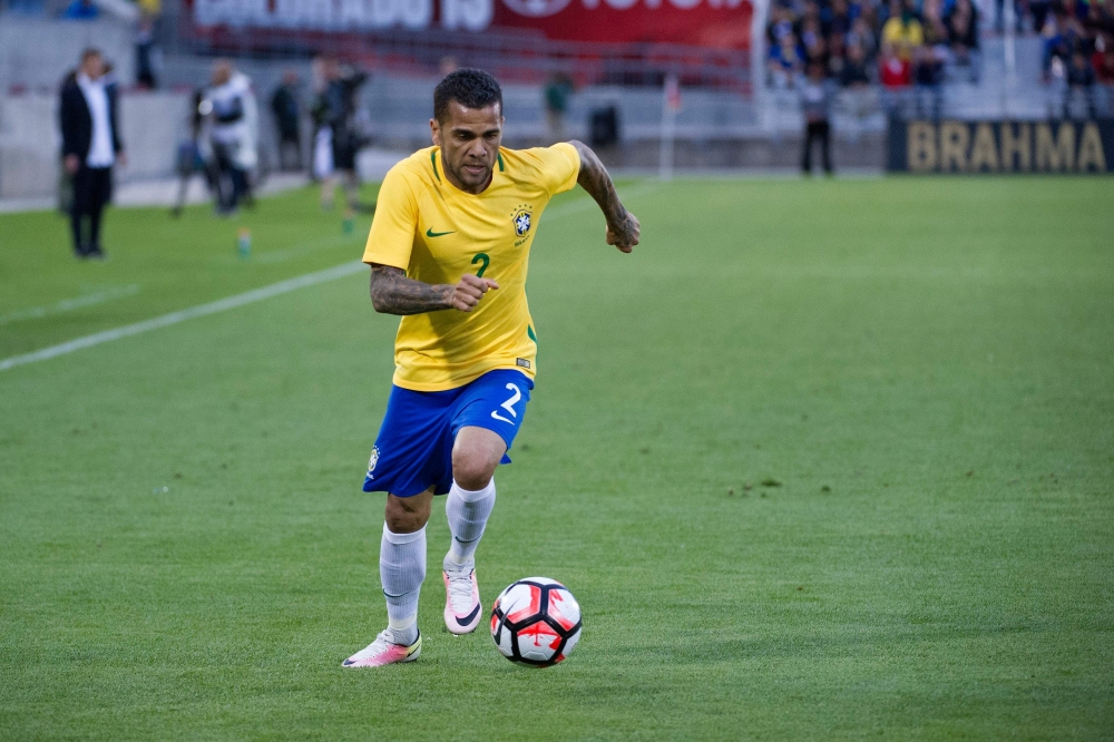 FILE PHOTO: Daniel Alves.  AFP / Jason Connolly
