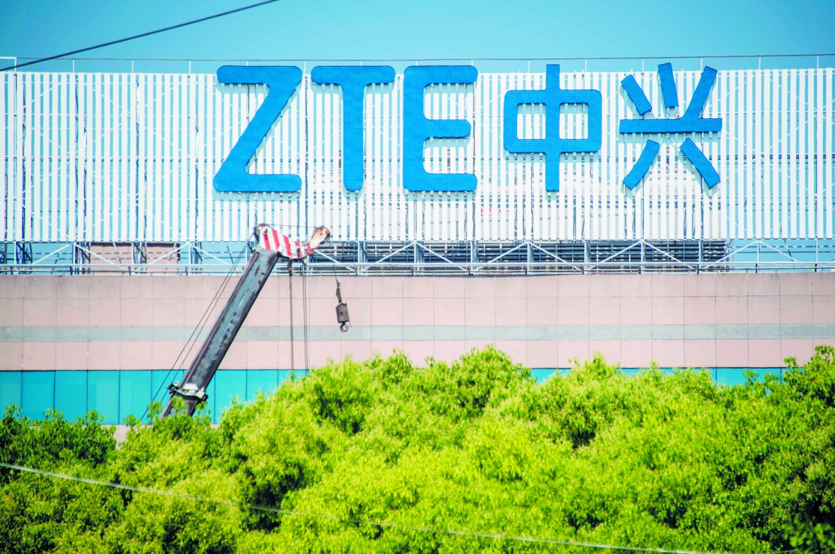 This picture taken on May 3, 2018 shows the ZTE logo on an office building in Shanghai. AFP / Johannes Eisele