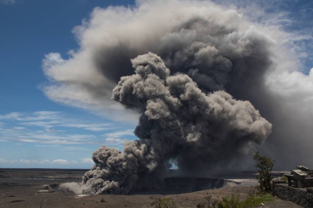 Ash plume rises following a massive Volcano eruption on Kilauea Volcano in Hawaii, United States on May 17, 2018. Lava is spewing more than 60 metres into the air and spread around 36,000 square metres. ( USGS / Handout - Anadolu Agency )
 

Ash plume 