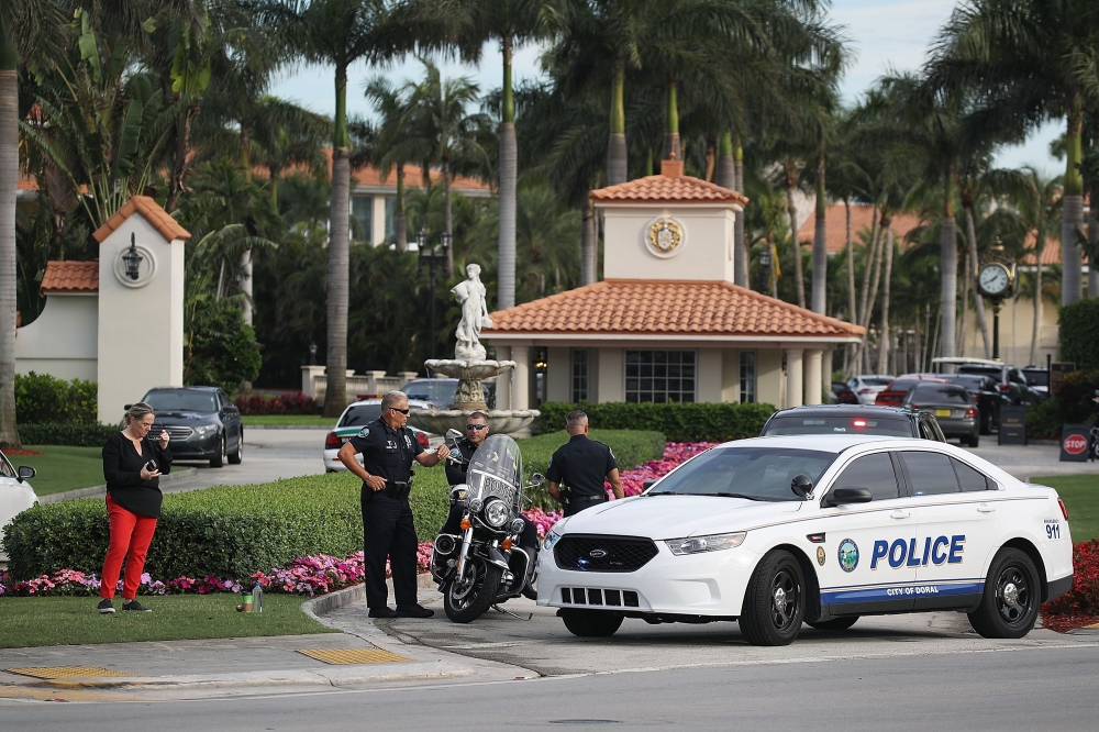 Police block off the entrance to the Trump National Doral Miami resort on May 18, 2018 in Doral, Florida.  Joe Raedle/Getty Images/AFP