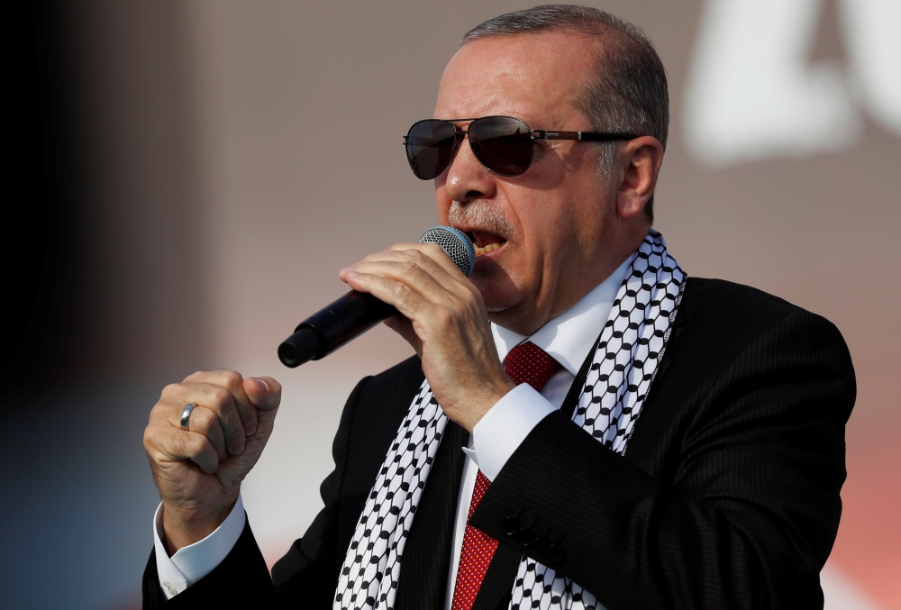 Turkish President Tayyip Erdogan delivers a speech during a protest against the recent killings of Palestinian protesters on the Gaza-Israel border and the U.S. embassy move to Jerusalem, in Istanbul, Turkey May 18, 2018. Reuters/Murad Sezer