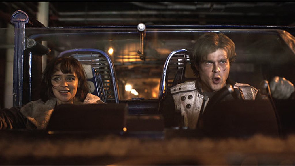 A still of the actors Alden Ehrenreich (R) and Emilia Clarke from the movie Solo: A Star Wars Story.