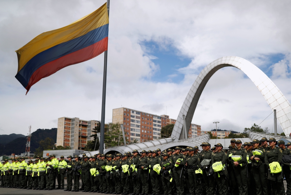 Police officers stand in formation outside a convention centre turned polling station, ahead of the May 27 presidential election, in Bogota, Colombia May 26, 2018. REUTERS/Carlos Garcia Rawlins