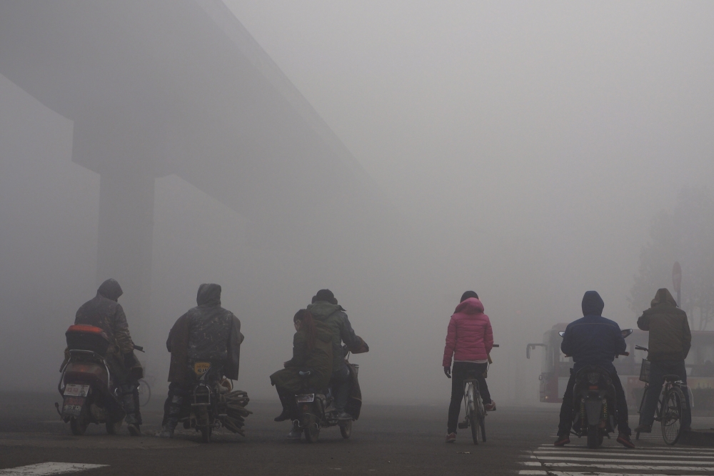 FILE PHOTO of heavy smog in Shijiazhuang, Hebei province, China. REUTERS
