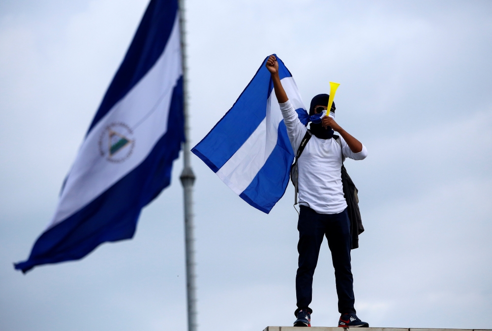 A demonstrator takes part in a protest march against Nicaraguan President Daniel Ortega's government in Managua, Nicaragua May 26, 2018. Picture taken May 26, 2018. REUTERS/Oswaldo Rivas