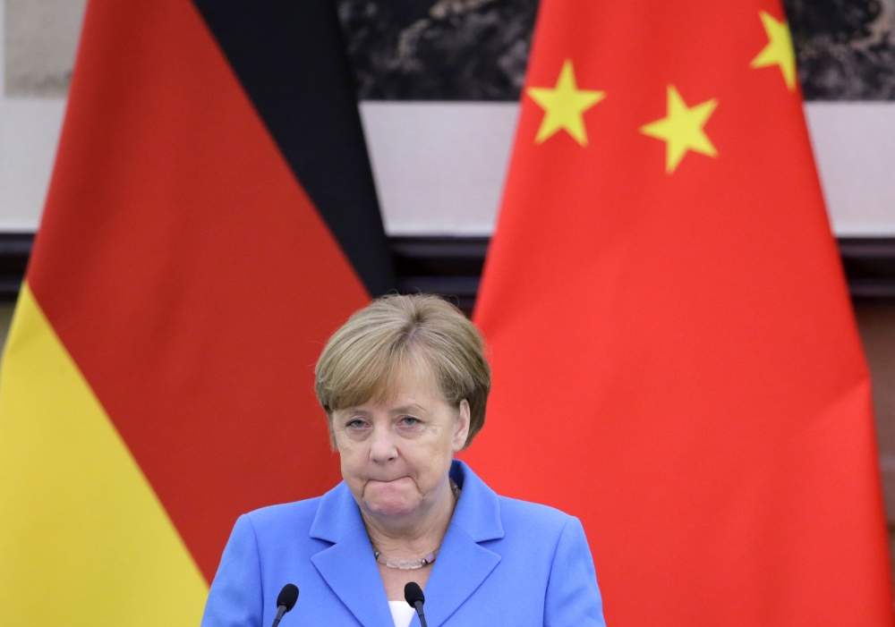 German Chancellor Angela Merkel attends a joint news conference with China's Premier Li Keqiang (not pictured) at the Great Hall of the People in Beijing, China, May 24, 2018. REUTERS/Jason Lee/Pool
 