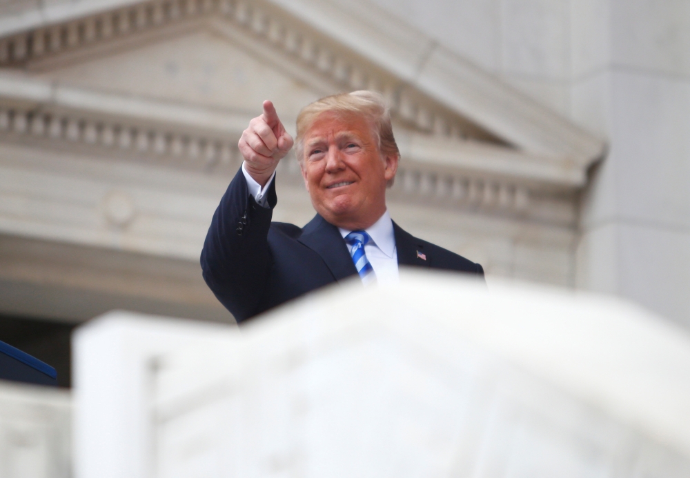 US President Donald Trump speaks at Arlington National Cemetery as part of Memorial Day observance, Arlington, Virginia, U.S., May 28, 2018. REUTERS/Eric Thayer