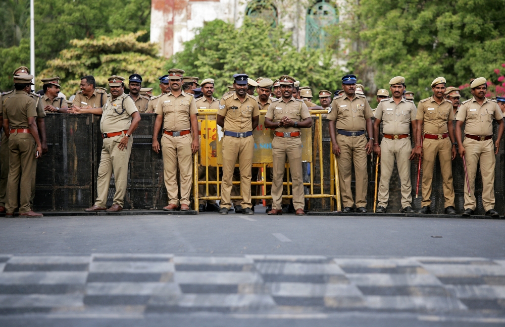 Policemen stand guard ahead of a protest, after at least 13 people were killed when police fired on protesters seeking closure of plant on environmental grounds in town of Thoothukudi in southern state of Tamil Nadu, in Chennai, India, May 24, 2018. Reute