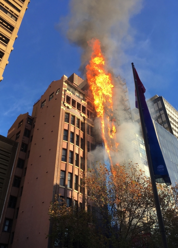 Flames can be seen coming from a building on fire in Sydney's central business district in Australia, May 31, 2018. Zorry Coates/via REUTERS 