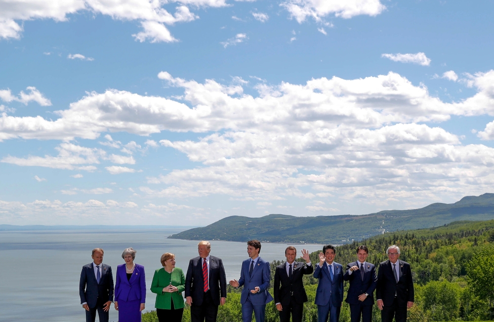 European Council President Donald Tusk, Britain's Prime Minister Theresa May, Germany's Chancellor Angela Merkel, U.S. President Donald Trump, Canada's Prime Minister Justin Trudeau, France's President Emmanuel Macron, Japan's Prime Minister Shinzo Abe, I