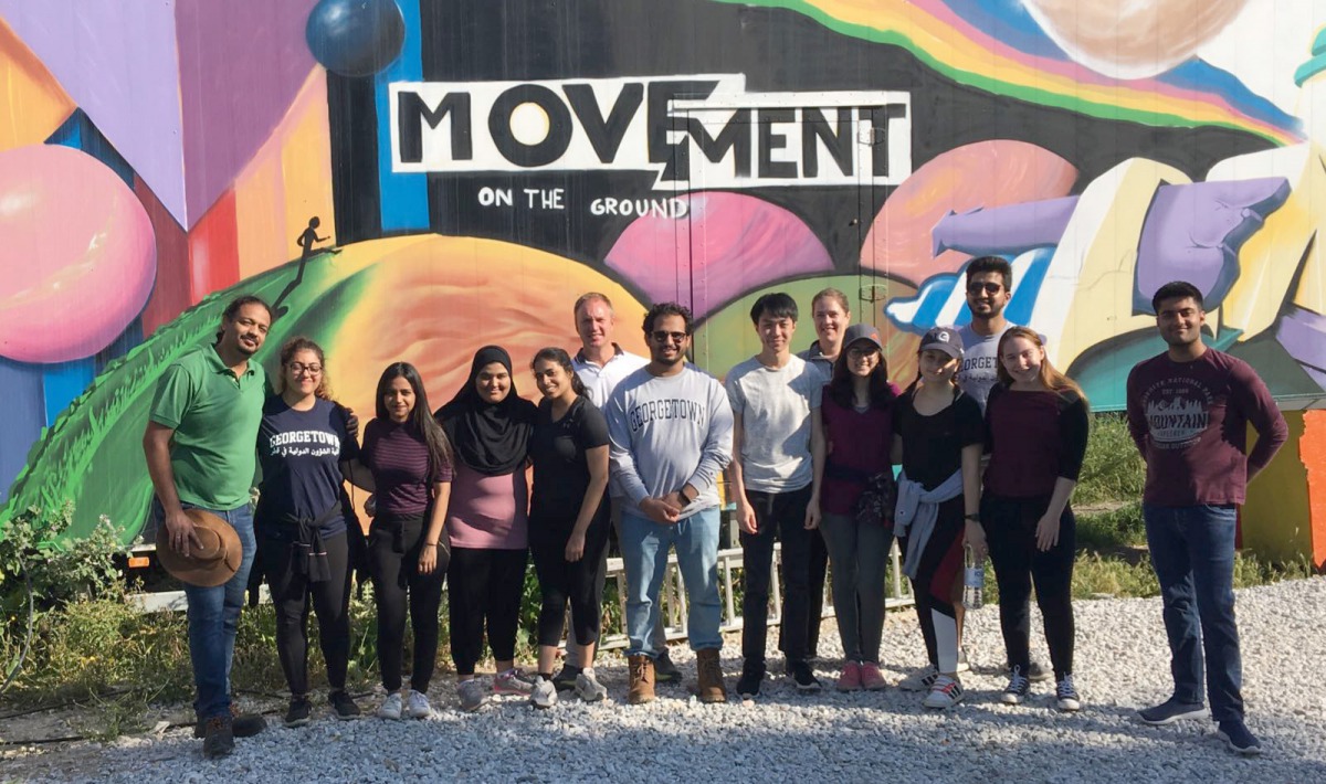 The students of Georgetown University in Qatar (GU-Q) in Greece as part of their visit there to volunteer and improve understanding of the ongoing Syrian refugee crisis. 
