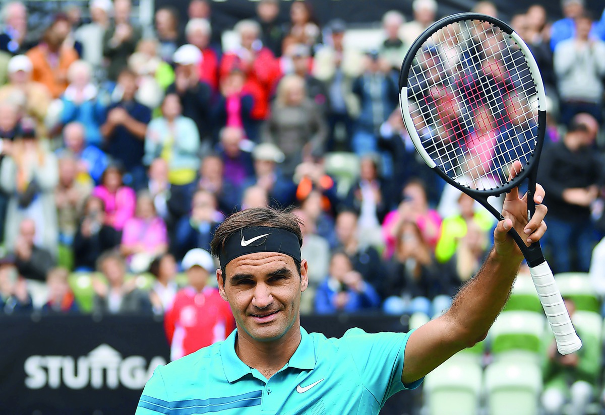 Swiss Roger Federer reacts after his victory over German Mischa Zverev at the ATP Mercedes Cup tennis tournament in Stuttgart, southwestern Germany, on June 13, 2018. AFP / dpa / Marijan murat