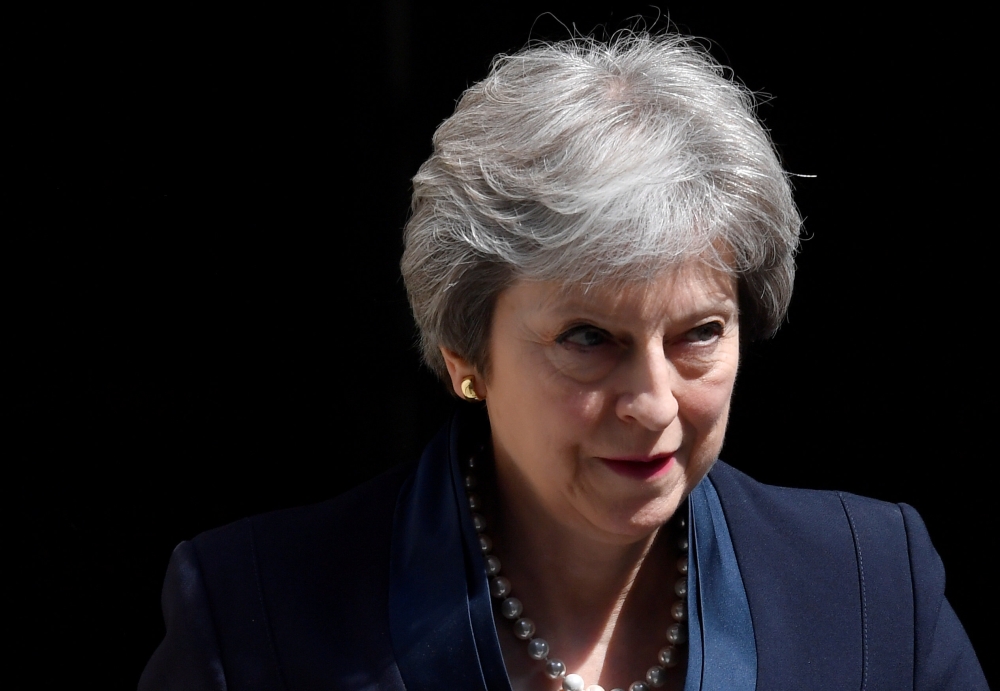 File photo of Britain's Prime Minister Theresa May leaving 10 Downing Street in London, Britain, May 23, 2018. REUTERS/Toby Melville/File Photo