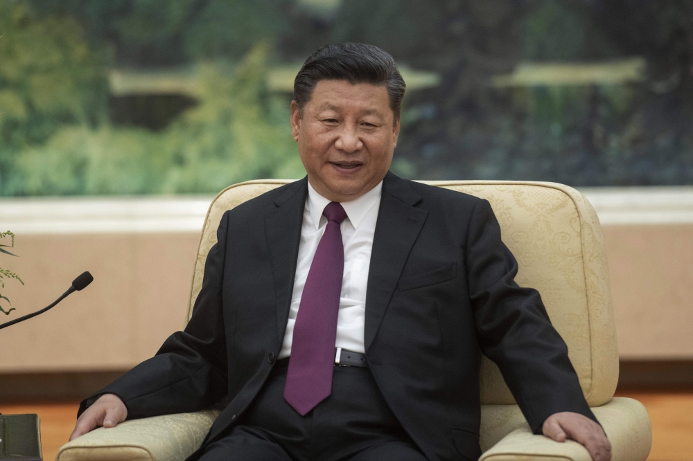 China's President Xi Jinping attends a meeting with US Secretary of State Mike Pompeo at the Great Hall of the People in Beijing on June 14, 2018. / AFP / Fred DUFOUR