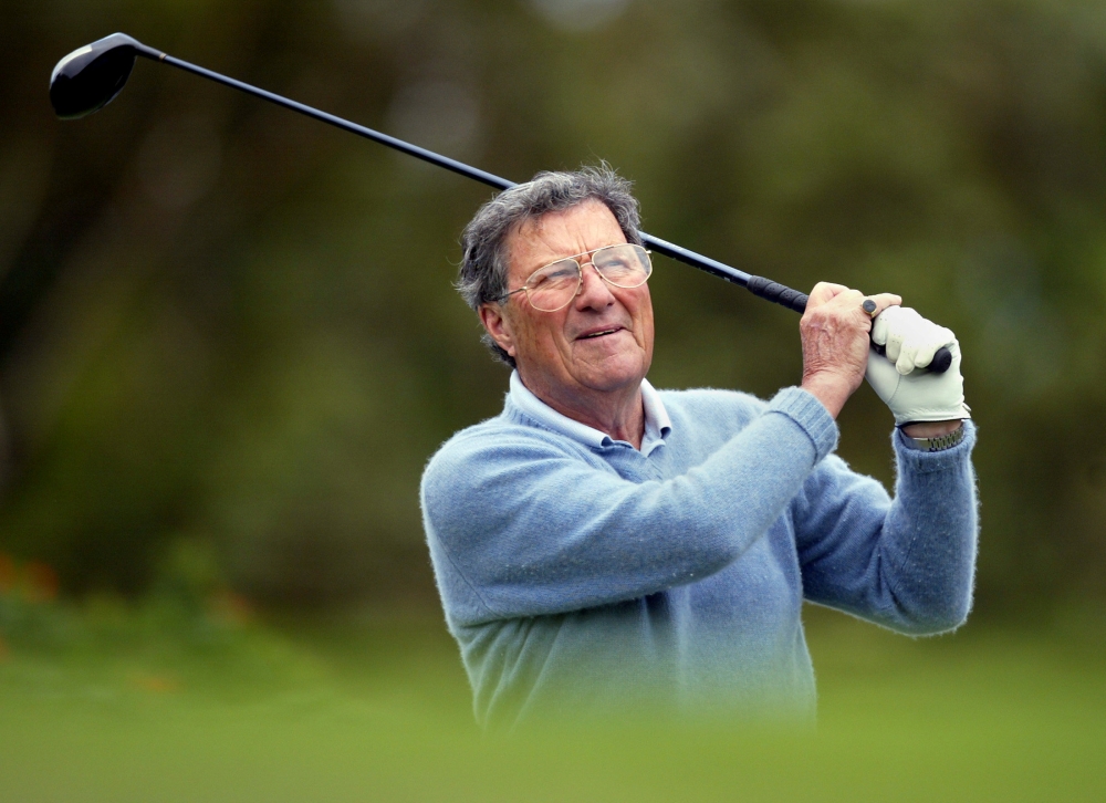 File photo of Australian golfer Peter Thomson tees off during a pro-am at the Australian Golf Club in Sydney November 24, 2004. REUTERS/Tim Wimborne/File Photo