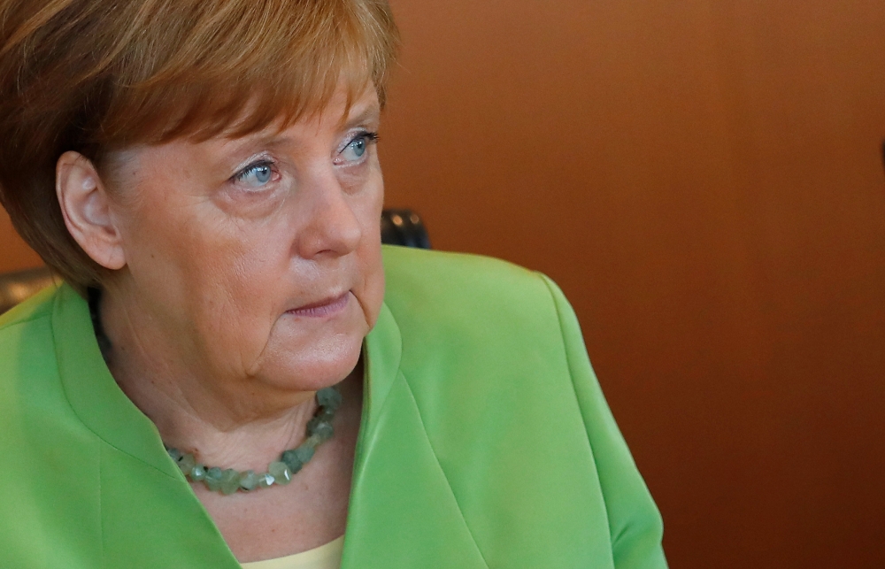 German Chancellor Angela Merkel arrives for the weekly cabinet meeting at the Chancellery in Berlin, Germany, June 20, 2018. REUTERS/Hannibal Hanschke