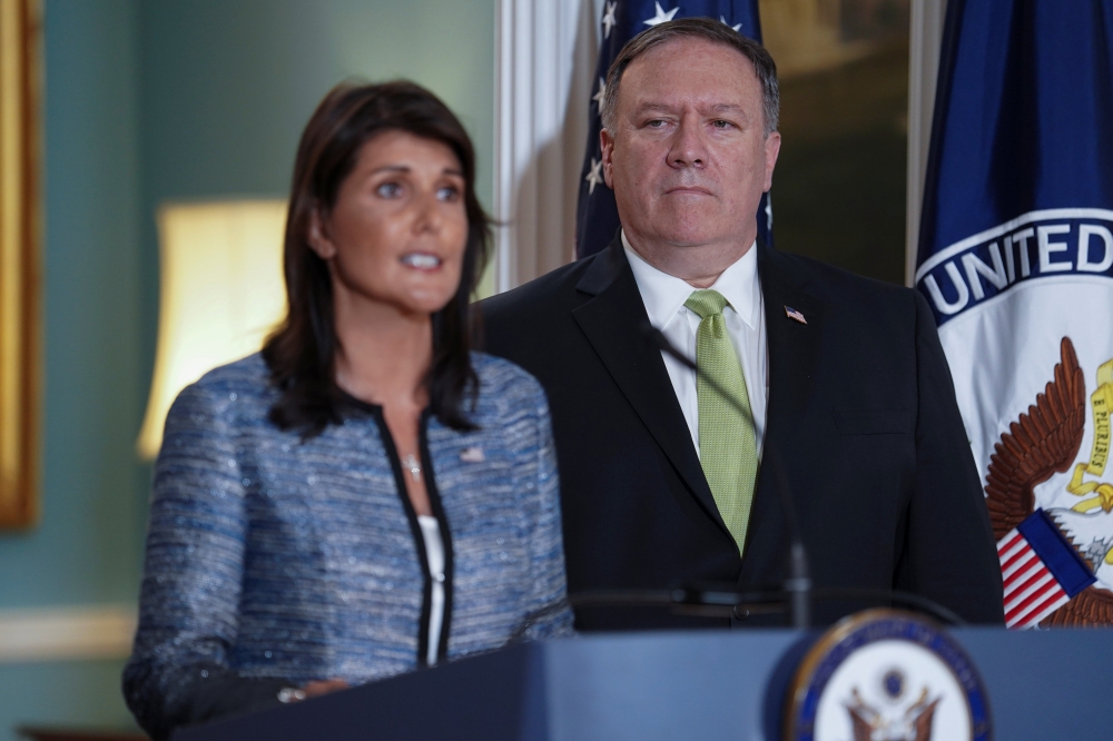 US Ambassador to the United Nations Nikki Haley delivers remarks to the press together with US Secretary of State Mike Pompeo, announcing the US's withdrawal from the UN's Human Rights Council at the Department of State in Washington, US, June 19, 2018. R