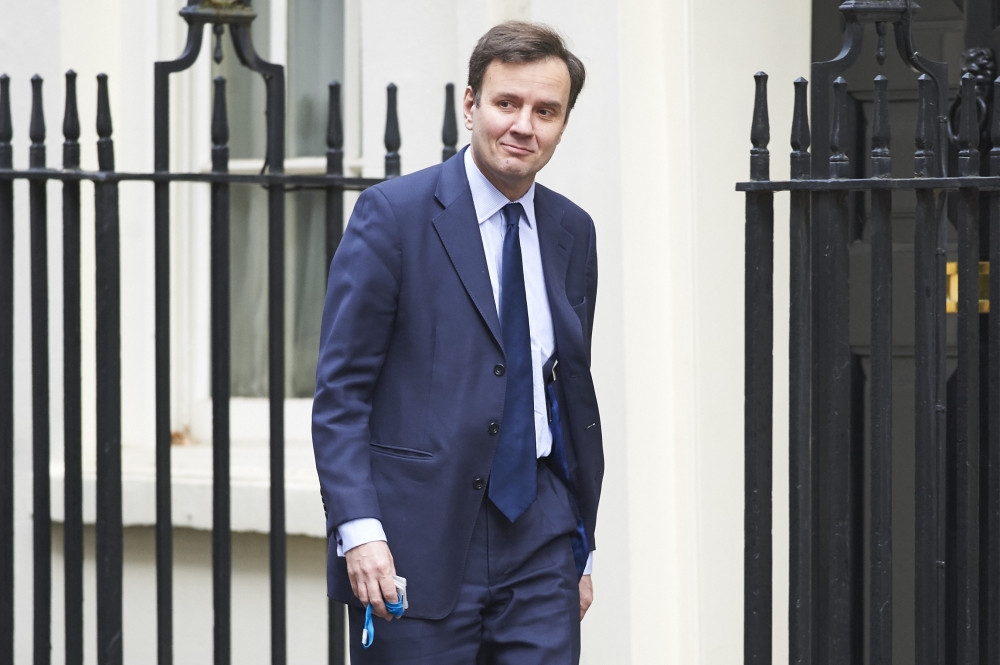 In this file photo taken on February 20, 2016 former British Chief Secretary to the Treasury Greg Hands arrives at Downing Street in London.  AFP / Niklas Halle'n

