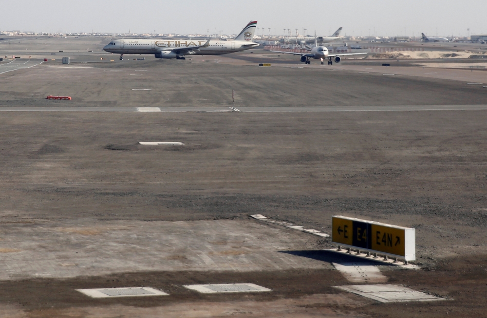 Etihad Airways planes are seen parked at Abu Dhabi International Airport in United Arab Emirates, December 16, 2017. (REUTERS/Amr Abdallah Dalsh/File Photo)