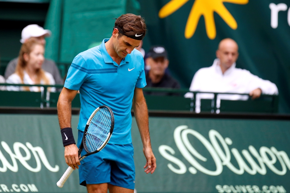Switzerland's Roger Federer looks dejected during the final against Croatia's Borna Coric (REUTERS/Leon Kuegeler)