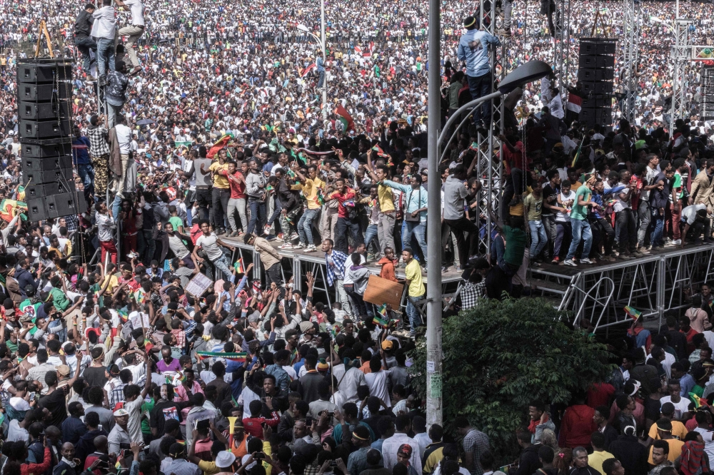 Supporters of Ethiopia Prime Minister attend a rally on Meskel Square in Addis Ababa on June 23, 2018. A blast at the rally in Ethiopia's capital in support of new Prime Minister Abiy Ahmed killed several people. (AFP / YONAS TADESSE)