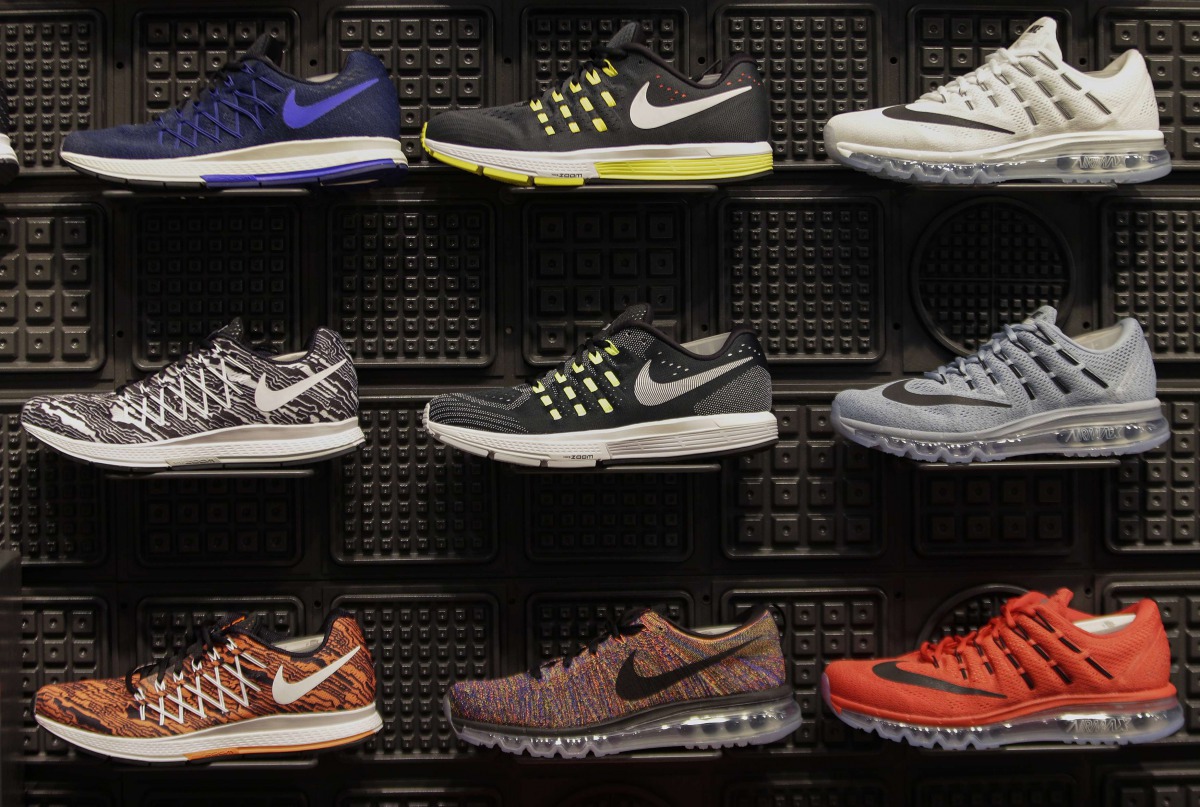 The sports apparel and footwear giant also became the latest big company to unveil a large new share repurchase program in the wake of the US corporate tax cuts.