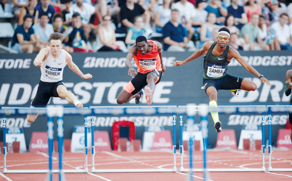 Qatar’s Abderrahman Samba (right) leads British Virgin Islands’ Kyron McMasters and Norway’s Karsten Warholm during the men’s 400M hurdles final at the Diamond League meet in the Charlety Stadium, Paris, yesterday. 