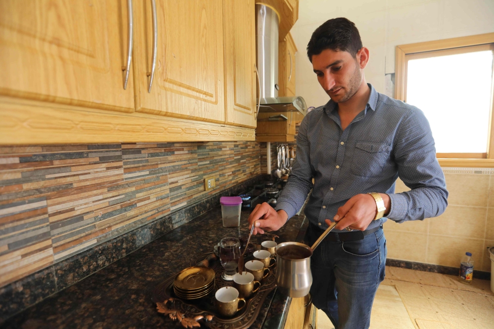 Overall, coffee drinkers were about 10 percent to 15 percent less likely to die than abstainers during a decade of follow-up. Differences by amount of coffee consumed and genetic variations were minimal. (AFP / Omar Haj Kadour) 
