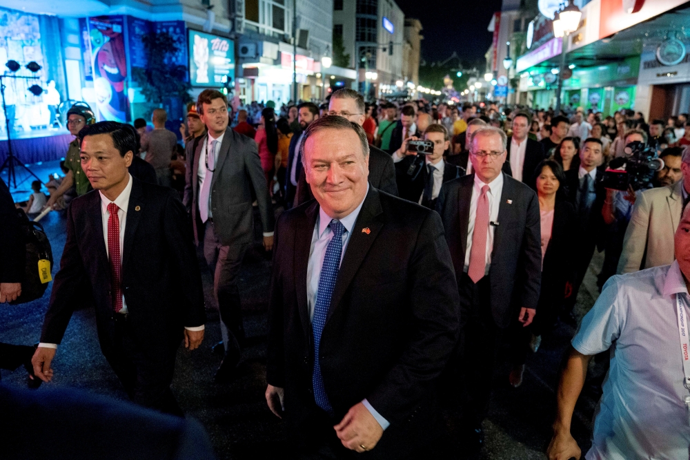 U.S. Secretary of State Mike Pompeo, walks through the streets of Hanoi, Vietnam July 8, 2018. Andrew Harnik/Pool via Reuters