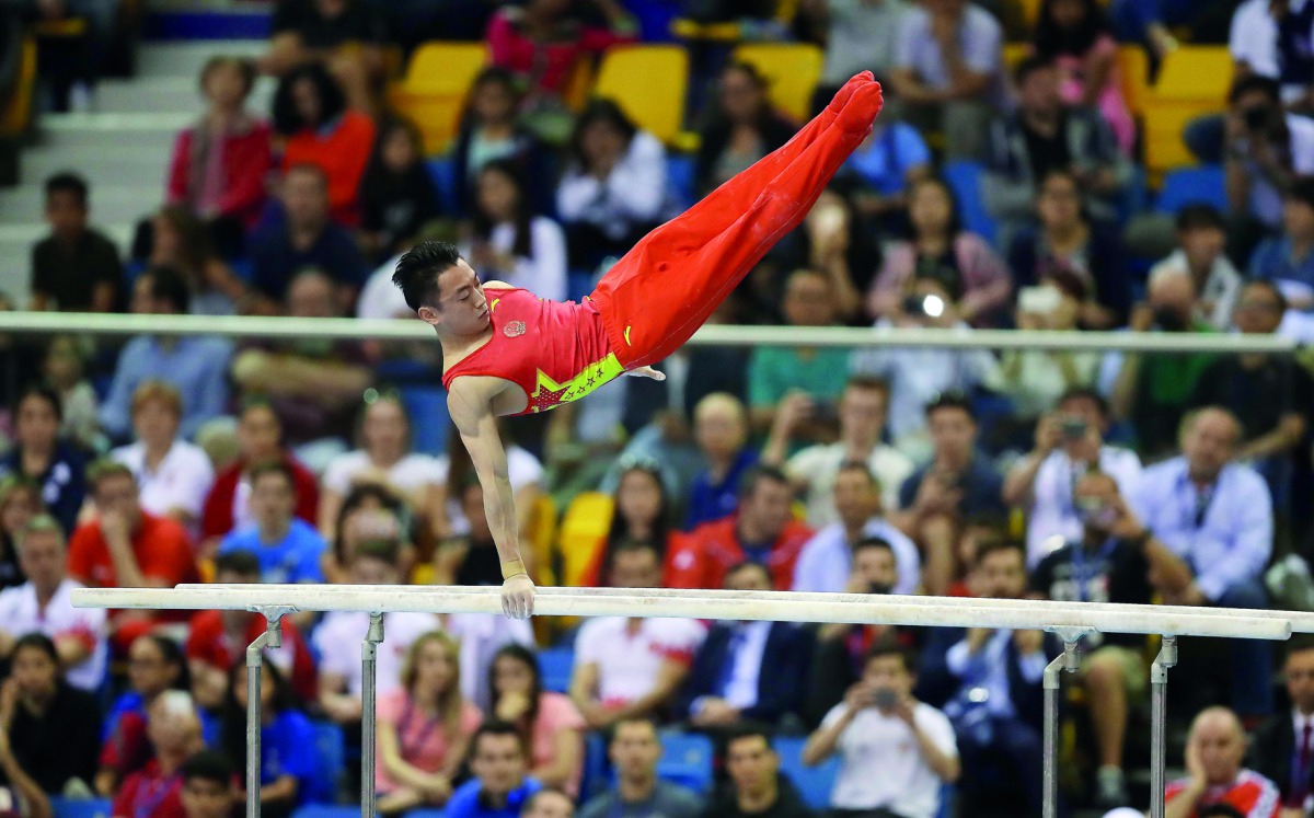 A gymnast in action at FIG Artistic Gymnastics World Cup Doha 2018.