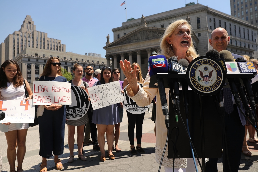 Congresswoman Carolyn Maloney joins local politicians, activists and others for a protest to denounce President Donald Trump's selection of Brett Kavanaugh as his nomination to the Supreme Court on July 10, 2018 in New York City.  Spencer Platt/Getty Imag