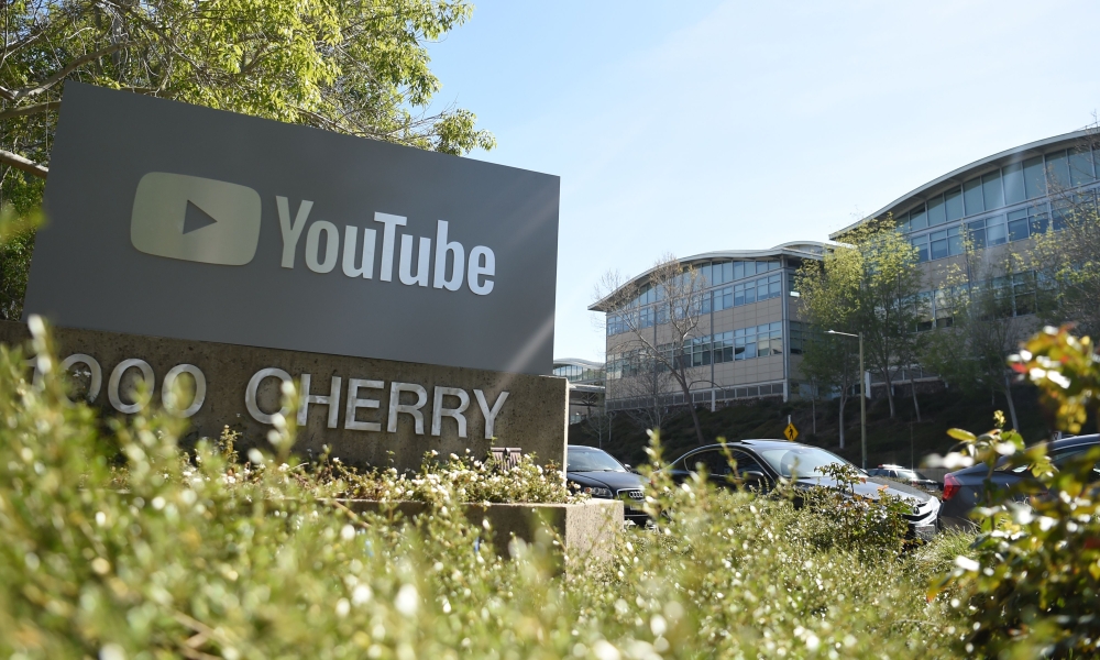 In this file photo taken on April 3, 2018, a YouTube sign is seen at its corporate headquarters in San Bruno, California.  AFP / Josh Edelson