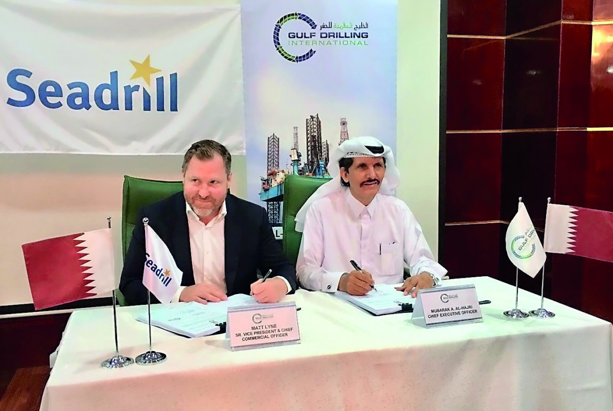 Mubarak A Al Hajri (right), GDI Chief Executive Officer, and Anton Dibowitz, Seadrill Chief Executive Officer, signing the cooperation agreement.