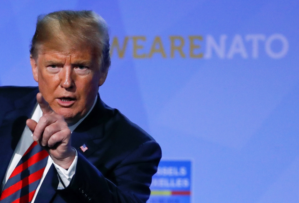 U.S. President Donald Trump holds a news conference after participating in the NATO Summit in Brussels, Belgium July 12, 2018. (REUTERS/Yves Herman)