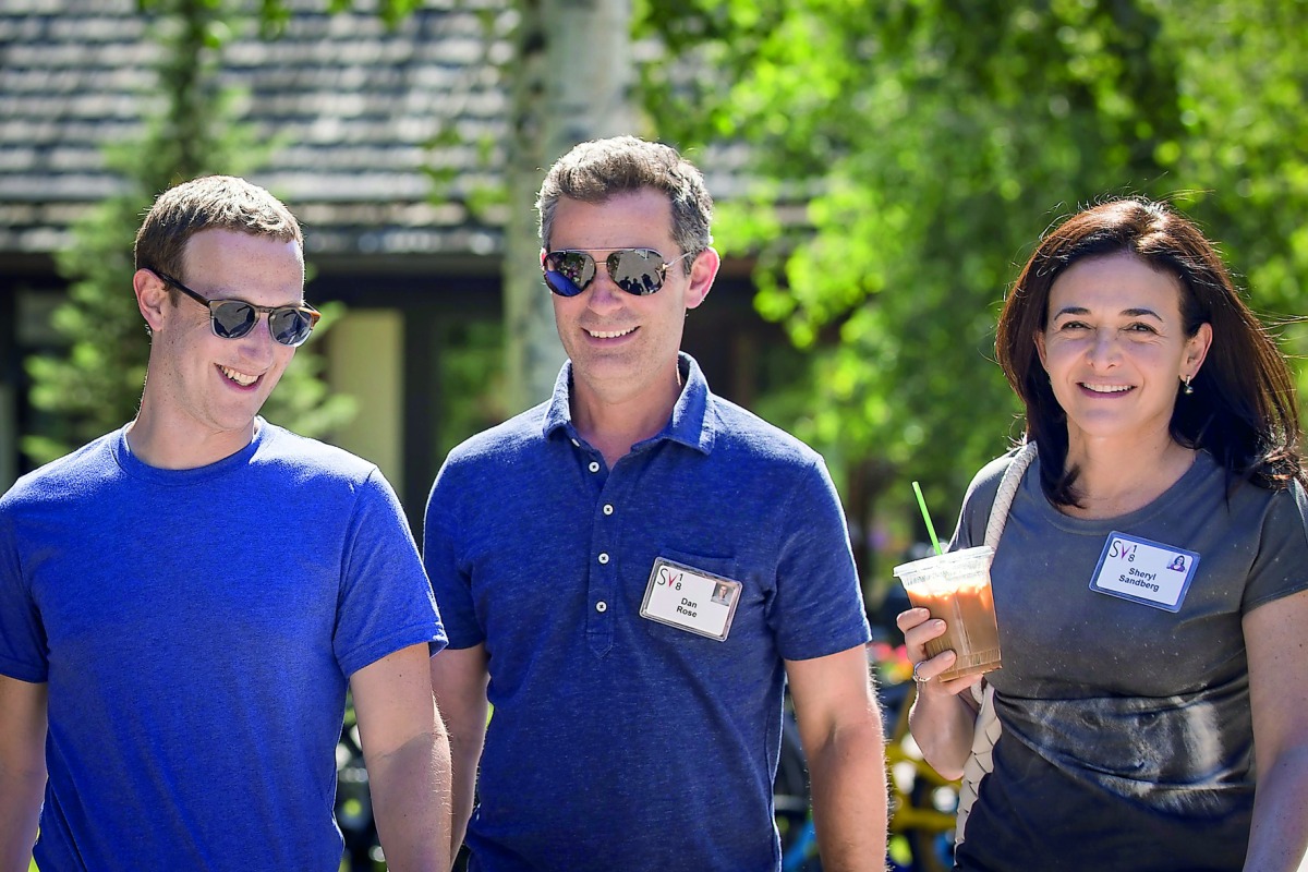 Mark Zuckerberg, chief executive officer of Facebook, Dan Rose, vice president, partnerships at Facebook, and Sheryl Sandberg, chief operating officer of Facebook, attend the annual Allen & Company Sun Valley Conference, July 12, 2018 in Sun Valley, Idaho