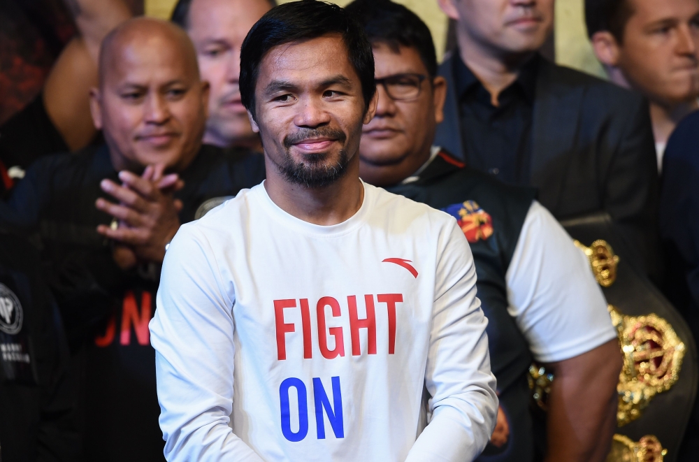 Philippines' Manny Pacquiao attends the weigh-in in Kuala Lumpur on July 14, 2018, ahead of his world welterweight boxing championship bout against Argentina's Lucas Matthysse on July 15. / AFP / Mohd RASFAN