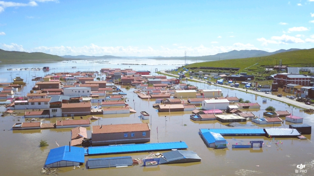 A flooded village is seen Zoige County, Sichuan, China July 13, 2018, in this still image taken from a video obtained from social media on July 14, 2018. TONGZHOU SONG/via REUTERS 