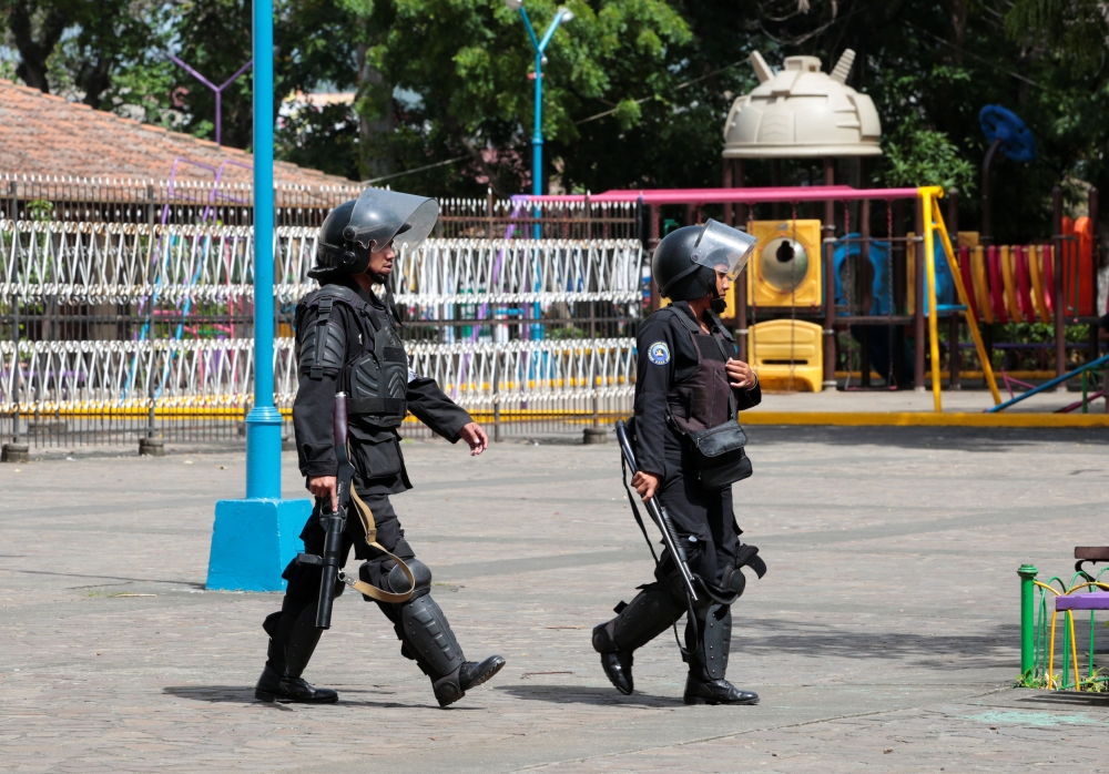 Members of Nicaragua's Special Forces walk during clashes with anti-government protesters in the indigenous community of Monimbo in Masaya, Nicaragua July 13, 2018. REUTERS/Oswaldo Rivas