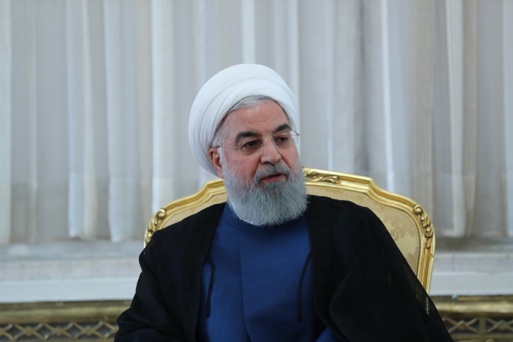 A handout picture provided by the Iranian presidency shows the Iranian president Hassan Rouhani (C) during a meeting in Tehran on July 14, 2018. AFP / IRANIAN PRESIDENCY / HO